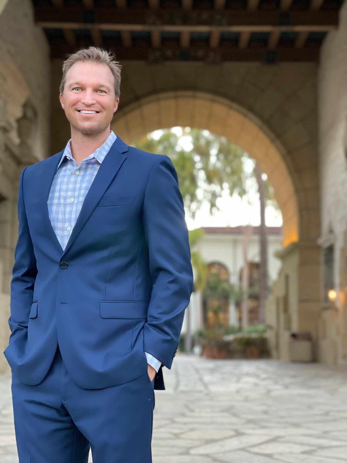 Caleb Overton, real estate agent, at the Santa Barbara Courthouse arches